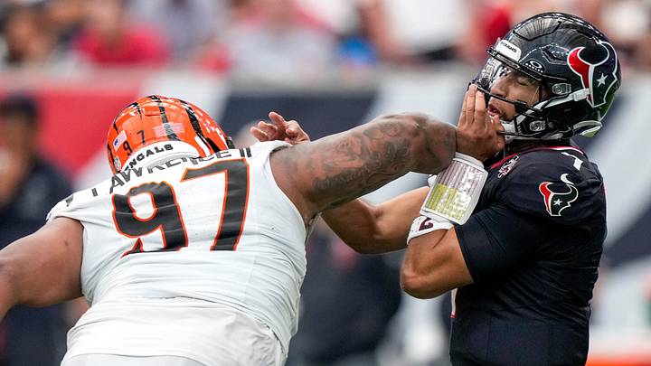 Cincinnati Bengals defensive tackle Dexter Lawrence II (97) drives into Houston Texans quarterback C.J. Stroud (7) as he throws in the fourth quarter of the NFL Week 2 game between the Houston Texans and the Cincinnati Bengals at Reliant Stadium in Houston on Sunday, Sept. 20, 2026. The Bengals improved to 2-0 on the season with a 20-6 win on the road. Cincinnati Bengals defensive tackle Dexter Lawrence II (97) drives into Houston Texans quarterback C.J. Stroud (7) as he throws in the fourth quarter of the NFL Week 2 game between the Houston Texans and the Cincinnati Bengals at Reliant Stadium in Houston on Sunday, Sept. 20, 2026. The Bengals improved to 2-0 on the season with a 20-6 win on the road.
