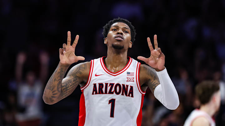 Feb 26, 2025; Tucson, Arizona, USA; Arizona Wildcats guard Caleb Love (1) holds up threes after he shot a three point basket during the first half against the Utah Utes at McKale Center. Mandatory Credit: Aryanna Frank-Imagn Images