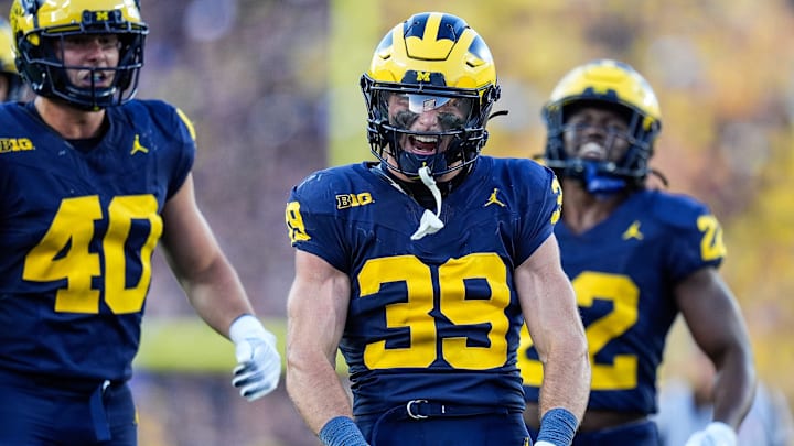 Michigan linebacker Jack MacKinnon (39) celebrates a play against USC during the second half at Michigan Stadium in Ann Arbor on Saturday, Sept. 21, 2024.