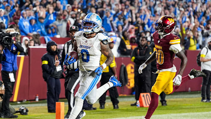 Detroit Lions running back Jahmyr Gibbs (0) runs for a touchdown against Washington Commanders safety Quan Martin (20) during the second half at Northwest Stadium in Landover, Md. on Sunday, November 9, 2025. Detroit Lions running back Jahmyr Gibbs (0) runs for a touchdown against Washington Commanders safety Quan Martin (20) during the second half at Northwest Stadium in Landover, Md. on Sunday, November 9, 2025.