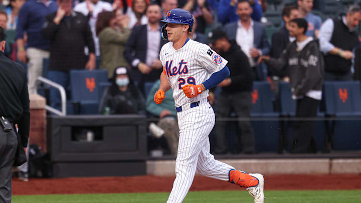 May 27, 2025; New York City, New York, USA; New York Mets first baseman Jared Young (29) runs the bases after hitting a two run home run during the first inning against the Chicago White Sox at Citi Field. Mandatory Credit: Vincent Carchietta-Imagn Images