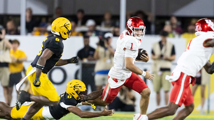 Oct 25, 2025; Tempe, Arizona, USA; Houston Cougars quarterback Conner Weigman (1) against the Arizona State Sun Devils in the first half at Mountain America Stadium. Mandatory Credit: Mark J. Rebilas-Imagn Images