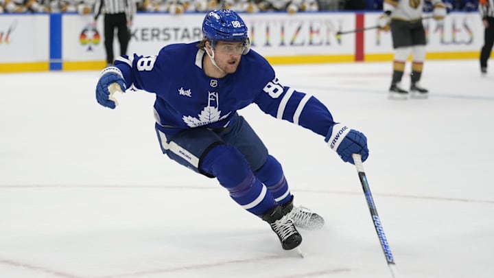Nov 20, 2024; Toronto, Ontario, CAN; Toronto Maple Leafs forward William Nylander (88) defends against the Vegas Golden Knights during the second period at Scotiabank Arena. Mandatory Credit: John E. Sokolowski-Imagn Images