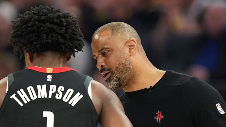 Apr 26, 2025; San Francisco, California, USA; Houston Rockets head coach Ime Udoka (right) talks with forward Amen Thompson (1) during the second quarter of game three of first round for the 2024 NBA Playoffs against the Golden State Warriors at Chase Center. Mandatory Credit: Darren Yamashita-Imagn Images Apr 26, 2025; San Francisco, California, USA; Houston Rockets head coach Ime Udoka (right) talks with forward Amen Thompson (1) during the second quarter of game three of first round for the 2024 NBA Playoffs against the Golden State Warriors at Chase Center. Mandatory Credit: Darren Yamashita-Imagn Images