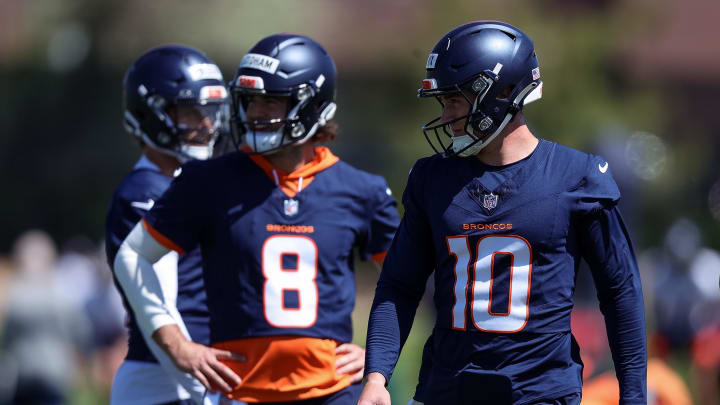 May 23, 2024; Englewood, CO, USA; Denver Broncos quarterback Bo Nix (10) and quarterback Jarrett Stidham (8) during organized team activities at Centura Health Training Center. Mandatory Credit: Isaiah J. Downing-USA TODAY Sports