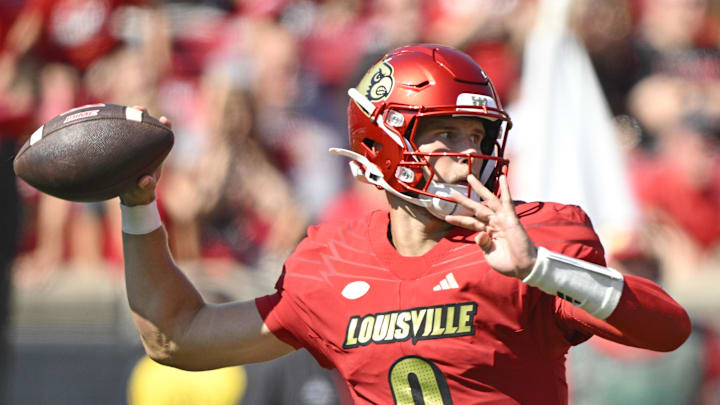 Oct 5, 2024; Louisville, Kentucky, USA;  Louisville Cardinals quarterback Tyler Shough (9) looks to pass against the Southern Methodist Mustangs during the first quarter at L&N Federal Credit Union Stadium. Mandatory Credit: Jamie Rhodes-Imagn Images