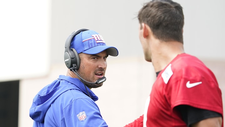 Jul 27, 2023; East Rutherford, NJ, USA;  Offensive coordinator Mike Kafka, left, and New York Giants quarterback Daniel Jones (8) talk on day two of training camp at the Quest Diagnostics Training Facility. Mandatory Credit: Danielle Parhizkaran-USA TODAY Sports