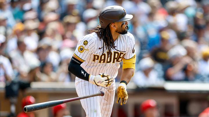 Jun 10, 2026; San Diego, California, USA; San Diego Padres second baseman Fernando Tatis Jr. (23) hits a one run home run during the ninth inning against the Cincinnati Reds at Petco Park. Mandatory Credit: David Frerker-Imagn Images