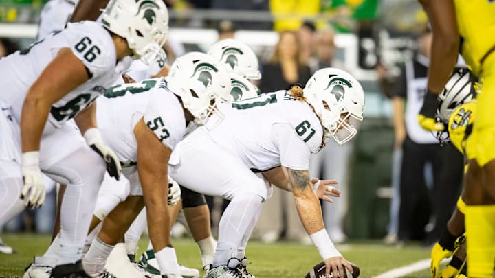 Michigan State Spartans center Tanner Miller lines up to snap the ball as the Ducks host the Spartans Friday, Oct. 4, 2024 at Autzen Stadium in Eugene, Ore. Michigan State Spartans center Tanner Miller lines up to snap the ball as the Ducks host the Spartans Friday, Oct. 4, 2024 at Autzen Stadium in Eugene, Ore.
