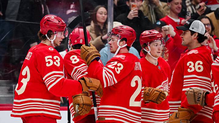 Dec 21, 2025; Detroit, Michigan, USA; Detroit Red Wings defenseman Moritz Seider (53) celebrates his game winning goal with left wing Lucas Raymond (23) during overtime against the Washington Capitals at Little Caesars Arena. Mandatory Credit: Tim Fuller-Imagn Images Dec 21, 2025; Detroit, Michigan, USA; Detroit Red Wings defenseman Moritz Seider (53) celebrates his game winning goal with left wing Lucas Raymond (23) during overtime against the Washington Capitals at Little Caesars Arena. Mandatory Credit: Tim Fuller-Imagn Images