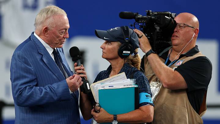 Dallas Cowboys owner Jerry Jones is interviewed during warmups before a game against the New York Giants at MetLife Stadium. 