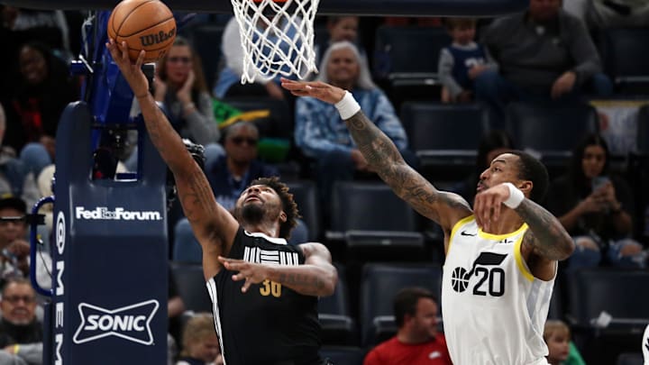 Nov 10, 2023; Memphis, Tennessee, USA; Memphis Grizzlies guard Marcus Smart (36) shoots as Utah Jazz