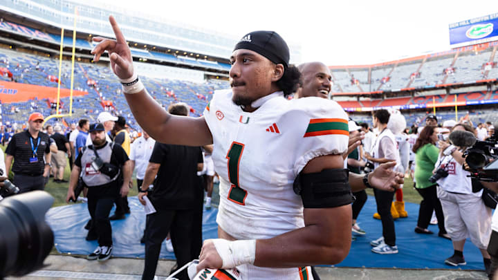 Aug 31, 2024; Gainesville, Florida, USA; Miami Hurricanes quarterback Cam Ward (1) reacts after a game against the Florida Gators at Ben Hill Griffin Stadium. Mandatory Credit: Matt Pendleton-Imagn Images