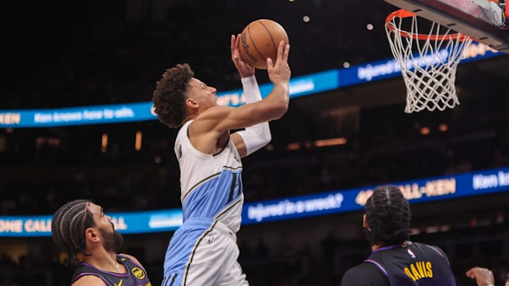 Dec 6, 2024; Atlanta, Georgia, USA; Atlanta Hawks forward Jalen Johnson (1) shoots against the Los Angeles Lakers in the fourth quarter at State Farm Arena. Mandatory Credit: Brett Davis-Imagn Images