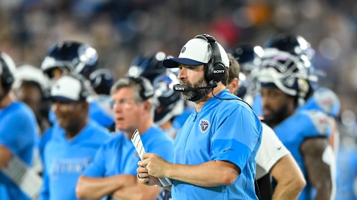 Aug 22, 2025; Nashville, Tennessee, USA;  Tennessee Titans head coach Brian Callahan walks the sideline against the Minnesota Vikings during the first half at Nissan Stadium. Mandatory Credit: Steve Roberts-Imagn Images