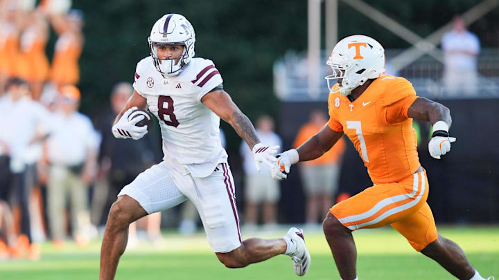 Mississippi State tight end Seydou Traore (8) runs the ball while defended by Tennessee linebacker Arion Carter (7) during a college football game between Tennessee and Mississippi State at Davis Wade Stadium in Starkville, Miss., on Sept. 27, 2025.