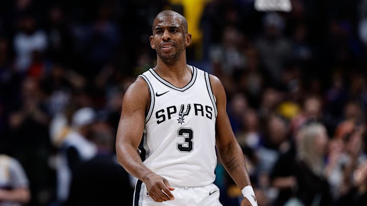 Apr 2, 2025; Denver, Colorado, USA; San Antonio Spurs guard Chris Paul (3) in the first quarter against the Denver Nuggets at Ball Arena. Mandatory Credit: Isaiah J. Downing-Imagn Images