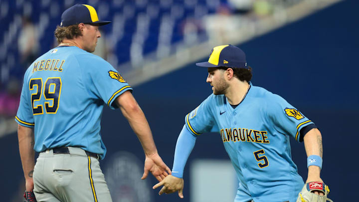 Apr 17, 2026; Miami, Florida, USA; Milwaukee Brewers center fielder Garrett Mitchell (5) celebrates with pitcher Trevor Megill (29) after the game against the Miami Marlins at loanDepot Park. Mandatory Credit: Sam Navarro-Imagn Images