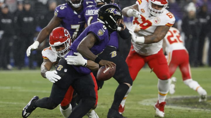 Jan 28, 2024; Baltimore, Maryland, USA; Baltimore Ravens quarterback Lamar Jackson (8) is sacked by Kansas City Chiefs defensive end Mike Danna (51) in the AFC Championship football game at M&T Bank Stadium. Mandatory Credit: Geoff Burke-USA TODAY Sports Jan 28, 2024; Baltimore, Maryland, USA; Baltimore Ravens quarterback Lamar Jackson (8) is sacked by Kansas City Chiefs defensive end Mike Danna (51) in the AFC Championship football game at M&T Bank Stadium. Mandatory Credit: Geoff Burke-USA TODAY Sports