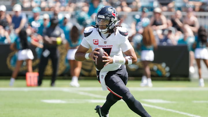 Sep 21, 2025; Jacksonville, Florida, USA; Houston Texans quarterback C.J. Stroud (7) runs with the ball during the second quarter against the Jacksonville Jaguars at EverBank Stadium. Mandatory Credit: Travis Register-Imagn Images