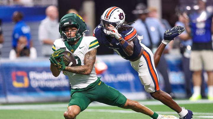 Sep 5, 2026; Atlanta, Georgia, USA; Baylor Bears wide receiver Jadon Porter (3) catches a pass in front of Auburn Tigers cornerback Champ Anthony (1) in the fourth quarter at Mercedes-Benz Stadium. Mandatory Credit: Brett Davis-Imagn Images Sep 5, 2026; Atlanta, Georgia, USA; Baylor Bears wide receiver Jadon Porter (3) catches a pass in front of Auburn Tigers cornerback Champ Anthony (1) in the fourth quarter at Mercedes-Benz Stadium. Mandatory Credit: Brett Davis-Imagn Images
