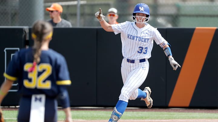Kentucky catcher Grace Lorsung (33) celebrates after hitting a home run in the fourth inning of a softball game against Michigan in the first round of the Stillwater Regional of the NCAA Tournament in Stillwater, Okla., Friday, May 17, 2024.