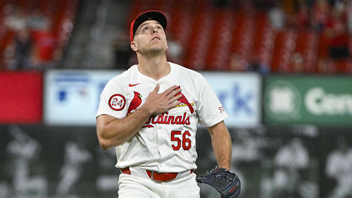 Sep 17, 2024; St. Louis, Missouri, USA;  St. Louis Cardinals relief pitcher Ryan Helsley (56) reacts after closing out the ninth inning in a victory over the Pittsburgh Pirates at Busch Stadium.