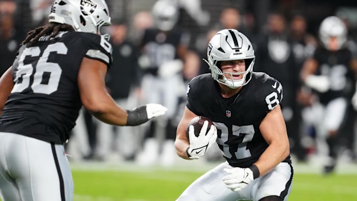 Sep 15, 2025; Paradise, Nevada, USA; Las Vegas Raiders tight end Michael Mayer (87) rushes during the second quarter against the Los Angeles Chargers at Allegiant Stadium. Mandatory Credit: Stephen R. Sylvanie-Imagn Images