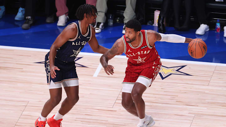 Feb 18, 2024; Indianapolis, Indiana, USA; Western Conference forward Paul George (13) of the LA Clippers dribbles the ball against Eastern Conference guard Tyrese Maxey (0) of the Philadelphia 76ers during the second quarter in the 73rd NBA All Star game at Gainbridge Fieldhouse. Mandatory Credit: Trevor Ruszkowski-USA TODAY Sports