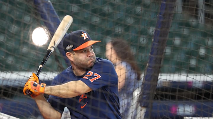 Houston Astros second baseman Jose Altuve (27) takes batting practice before playing against the Detroit Tigers in game one of the Wild Card round for the 2024 MLB Playoffs at Minute Maid Park. 