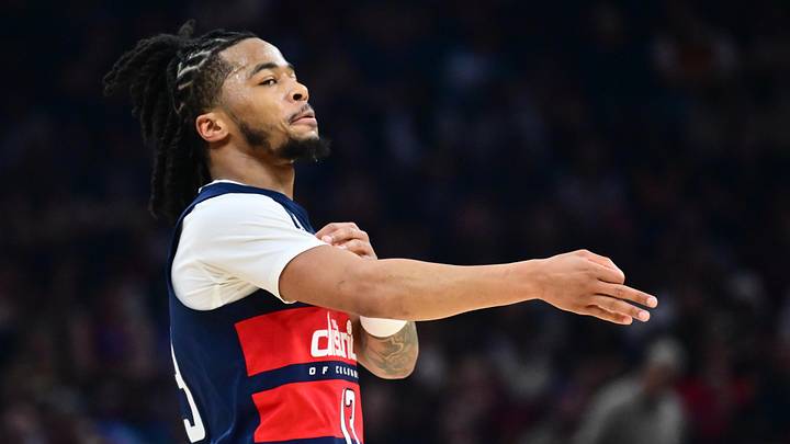 Apr 12, 2026; Cleveland, Ohio, USA; Washington Wizards guard Sharife Cooper (13) celebrates after hitting a three point basket against the Cleveland Cavaliers during the first half at Rocket Arena. Mandatory Credit: Ken Blaze-Imagn Images