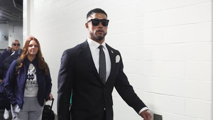 Nov 15, 2025; Pittsburgh, Pennsylvania, USA;  Notre Dame Fighting Irish head coach Marcus Freeman arrives at the stadium to coach the Fighting Irish against the Pittsburgh Panthers at Acrisure Stadium. Mandatory Credit: Charles LeClaire-Imagn Images