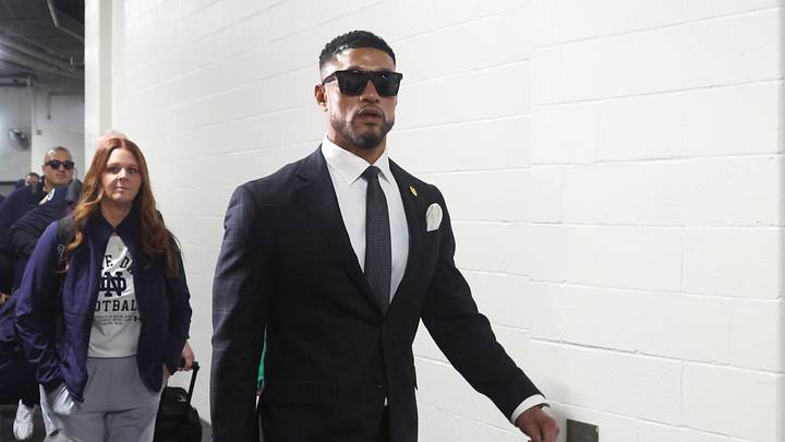 Nov 15, 2025; Pittsburgh, Pennsylvania, USA;  Notre Dame Fighting Irish head coach Marcus Freeman arrives at the stadium to coach the Fighting Irish against the Pittsburgh Panthers at Acrisure Stadium. Mandatory Credit: Charles LeClaire-Imagn Images