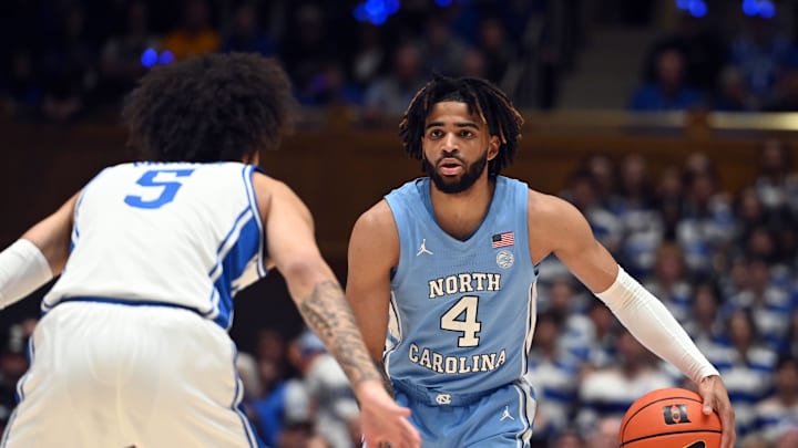 Mar 9, 2024; Durham, North Carolina, USA; North Carolina Tar Heels guard RJ Davis (4) controls the ball in front of Duke Blue Devils guard Tyrese Proctor (5) during the first half at Cameron Indoor Stadium. Mandatory Credit: Rob Kinnan-Imagn Images