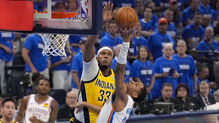 Jun 16, 2025; Oklahoma City, Oklahoma, USA; Indiana Pacers center Myles Turner (33) blocks a shot by Oklahoma City Thunder guard Aaron Wiggins (21) during the second quarter in game five of the 2025 NBA Finals at Paycom Center. Mandatory Credit: Kyle Terada-Imagn Images