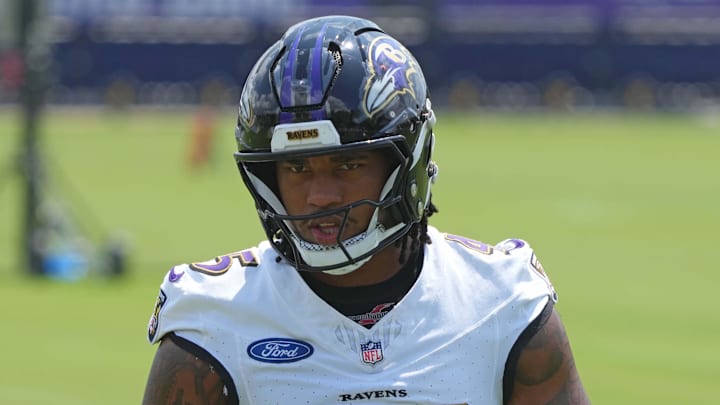 Jul 23, 2025; Owings Mills, MD, USA; Baltimore Ravens linebacker Mike Green (45) warms up during training camp at Under Armour Performance Center. Mandatory Credit: Mitch Stringer-Imagn Images