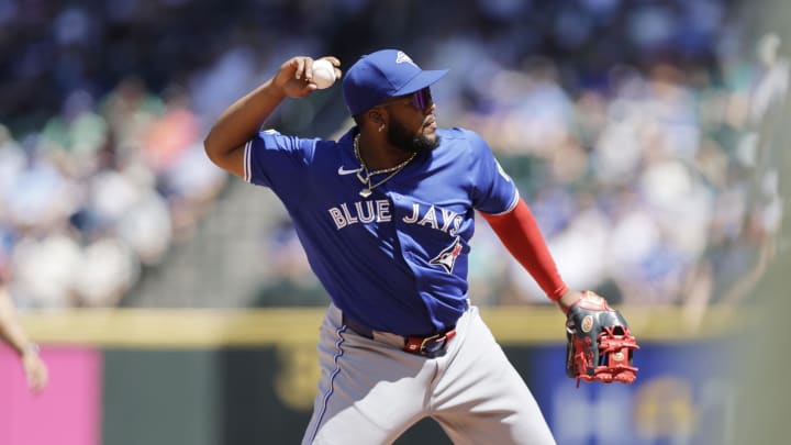 Toronto Blue Jays third baseman Vladimir Guerrero Jr. (27) throws out Seattle Mariners first baseman Ty France (23) during the fourth inning at T-Mobile Park on July 7. Toronto Blue Jays third baseman Vladimir Guerrero Jr. (27) throws out Seattle Mariners first baseman Ty France (23) during the fourth inning at T-Mobile Park on July 7.