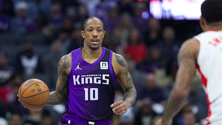 Dec 3, 2024; Sacramento, California, USA; Sacramento Kings forward DeMar DeRozan (10) dribbles the ball up the court during the first quarter against the Houston Rockets at Golden 1 Center. Dec 3, 2024; Sacramento, California, USA; Sacramento Kings forward DeMar DeRozan (10) dribbles the ball up the court during the first quarter against the Houston Rockets at Golden 1 Center.