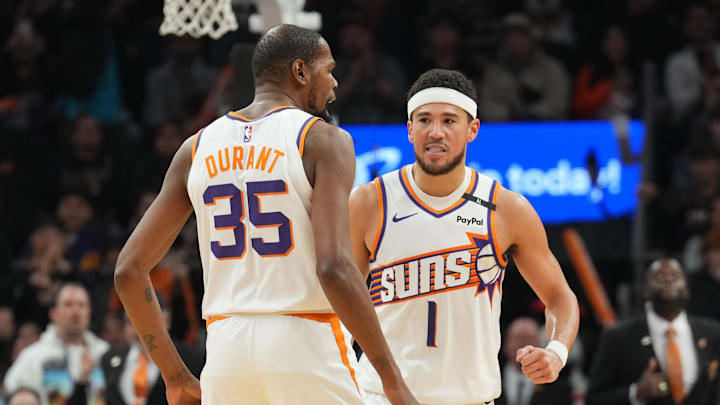 Jan 27, 2025; Phoenix, Arizona, USA; Phoenix Suns forward Kevin Durant (35) and Phoenix Suns guard Devin Booker (1) celebrate against the LA Clippers during the second half at Footprint Center. Mandatory Credit: Joe Camporeale-Imagn Images Jan 27, 2025; Phoenix, Arizona, USA; Phoenix Suns forward Kevin Durant (35) and Phoenix Suns guard Devin Booker (1) celebrate against the LA Clippers during the second half at Footprint Center. Mandatory Credit: Joe Camporeale-Imagn Images