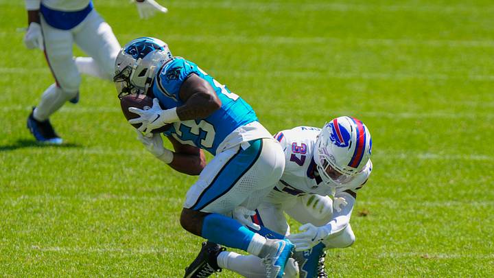Carolina Panthers running back Trevor Etienne (23) makes a catch and is tackled by Buffalo Bills cornerback Jordan Hancock Carolina Panthers running back Trevor Etienne (23) makes a catch and is tackled by Buffalo Bills cornerback Jordan Hancock