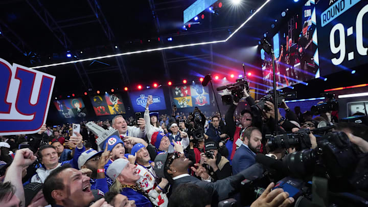 Wide receiver Malik Nabers  poses with Giants fans after he was announced as the team's 2024 first-round pick.