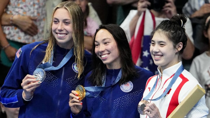Jul 28, 2024; Nanterre, France; Gretchen Walsh (USA), Torri Huske (USA) and Yufei Zhang (China) in the women’s 100-meter butterfly medal ceremony during the Paris 2024 Olympic Summer Games at Paris La Défense Arena. Mandatory Credit: Rob Schumacher-USA TODAY Sports Jul 28, 2024; Nanterre, France; Gretchen Walsh (USA), Torri Huske (USA) and Yufei Zhang (China) in the women’s 100-meter butterfly medal ceremony during the Paris 2024 Olympic Summer Games at Paris La Défense Arena. Mandatory Credit: Rob Schumacher-USA TODAY Sports