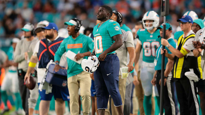 Miami Dolphins wide receiver Tyreek Hill (10) reacts on the sideline against the Jacksonville Jaguars during the second quarter at Hard Rock Stadium. Miami Dolphins wide receiver Tyreek Hill (10) reacts on the sideline against the Jacksonville Jaguars during the second quarter at Hard Rock Stadium.
