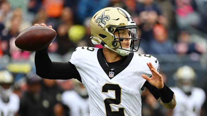 New Orleans Saints quarterback Spencer Rattler (2) drops back to pass against the Chicago Bears during the second quarter at Soldier Field. New Orleans Saints quarterback Spencer Rattler (2) drops back to pass against the Chicago Bears during the second quarter at Soldier Field.