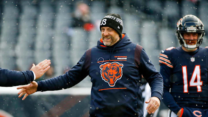 Jan 2, 2022; Chicago, Illinois, USA; Chicago Bears head coach Matt Nagy greets his staff during warmups before the game against the New York Giants at Soldier Field. Mandatory Credit: Jon Durr-Imagn Images