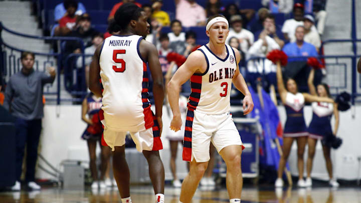 Nov 12, 2024; Oxford, Mississippi, USA; Mississippi Rebels guard Jaylen Murray (5) reacts with Mississippi Rebels guard Sean Pedulla (3) during the first half against the South Alabama Jaguars at C.M. 'Tad' Smith Coliseum. Mandatory Credit: Petre Thomas-Imagn Images