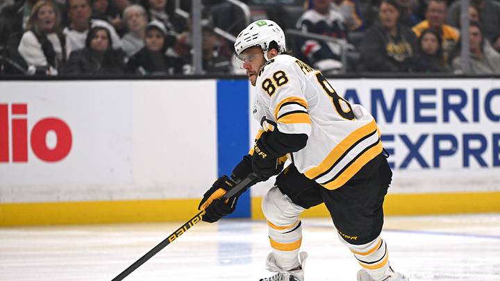 Oct 17, 2026; Los Angeles, California, USA;  Boston Bruins right wing David Pastrnak (88) skates with the puck against against the Los Angeles Kings during the third period at Crypto.com Arena.  Mandatory Credit: Griffin Hooper-Imagn Images