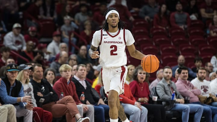 Dec 7, 2024; Fayetteville, Arkansas, USA;  Arkansas Razorbacks guard Boogie Fland (2) brings the ball down the court during the second half against the Texas-San Antonio Roadrunners at Bud Walton Arena. Arkansas won 75-60. Mandatory Credit: Brett Rojo-Imagn Images