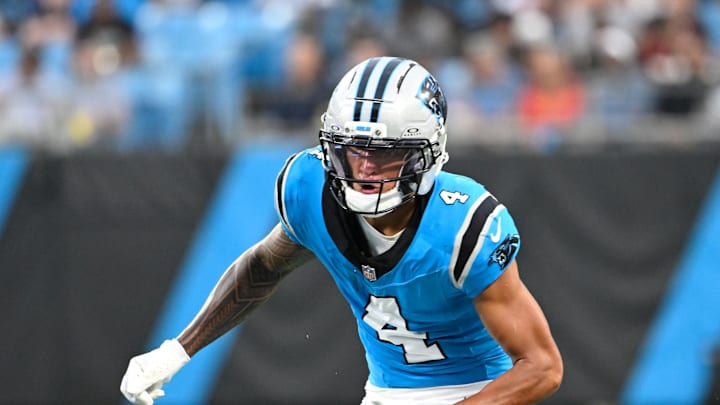 Aug 8, 2025; Charlotte, North Carolina, USA; Carolina Panthers wide receiver Tetairoa McMillan (4) on the field in the second quarter at Bank of America Stadium. Mandatory Credit: Bob Donnan-Imagn Images