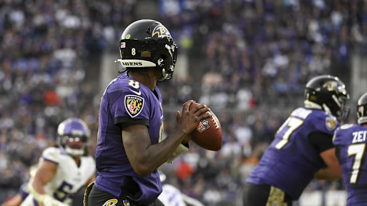 Nov 7, 2021; Baltimore, Maryland, USA; Baltimore Ravens quarterback Lamar Jackson (8) looks to pass from the pocket during the second half against the Minnesota Vikings  at M&T Bank Stadium. Mandatory Credit: Tommy Gilligan-Imagn Images